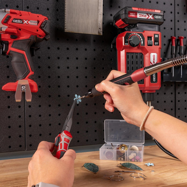Red and black power tool with accessories 