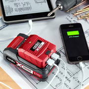 Red and white battery pack with 'ozito X PXC' branding 