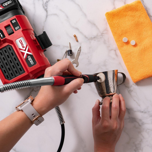 Red and black power tool with accessories 